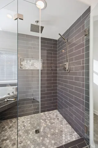 a view of dirt field with large trees