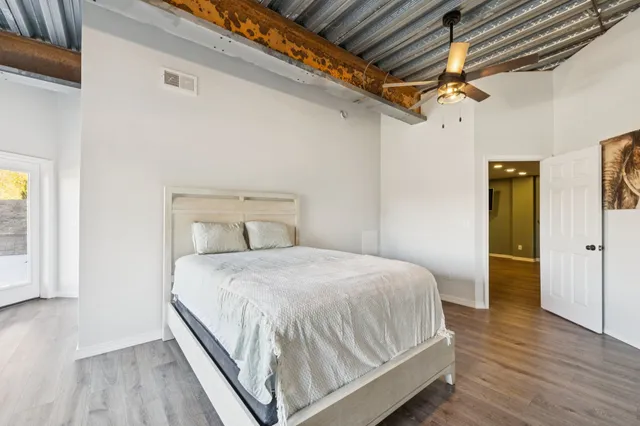 a view of a house with roof deck and sitting area