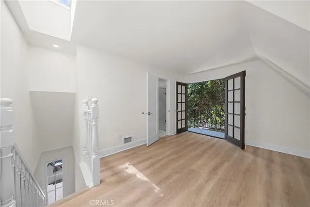 a view of a room with a large window