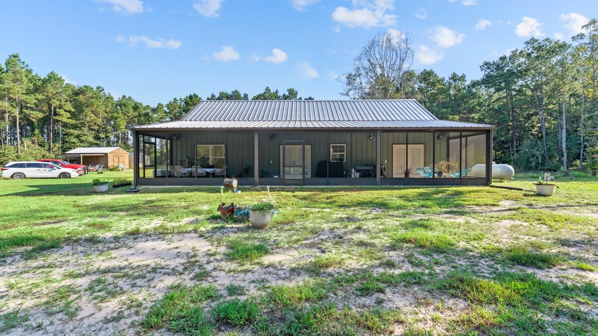 13052 Fm 1818 Huntington, TX 75949 - Photo 3 of 44 Back view of home with screened in porch