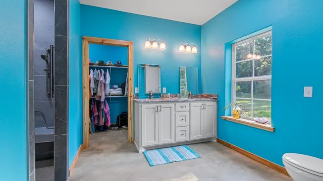 a room with a bed and a window