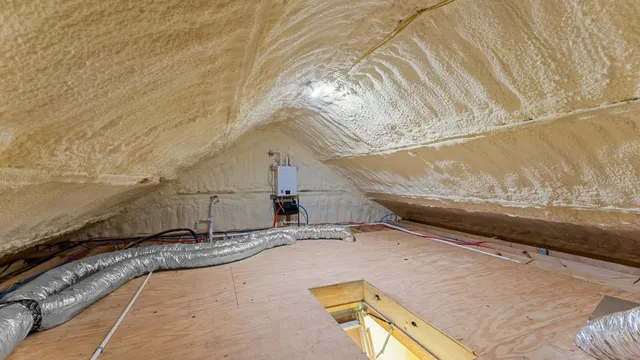 a bathroom with a sink a mirror and shower
