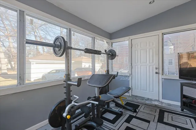 a bathroom with a double vanity sink a toilet and a mirror