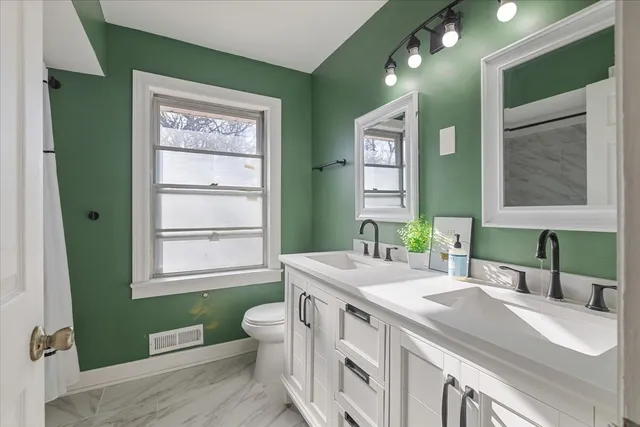 a workspace with furniture and window