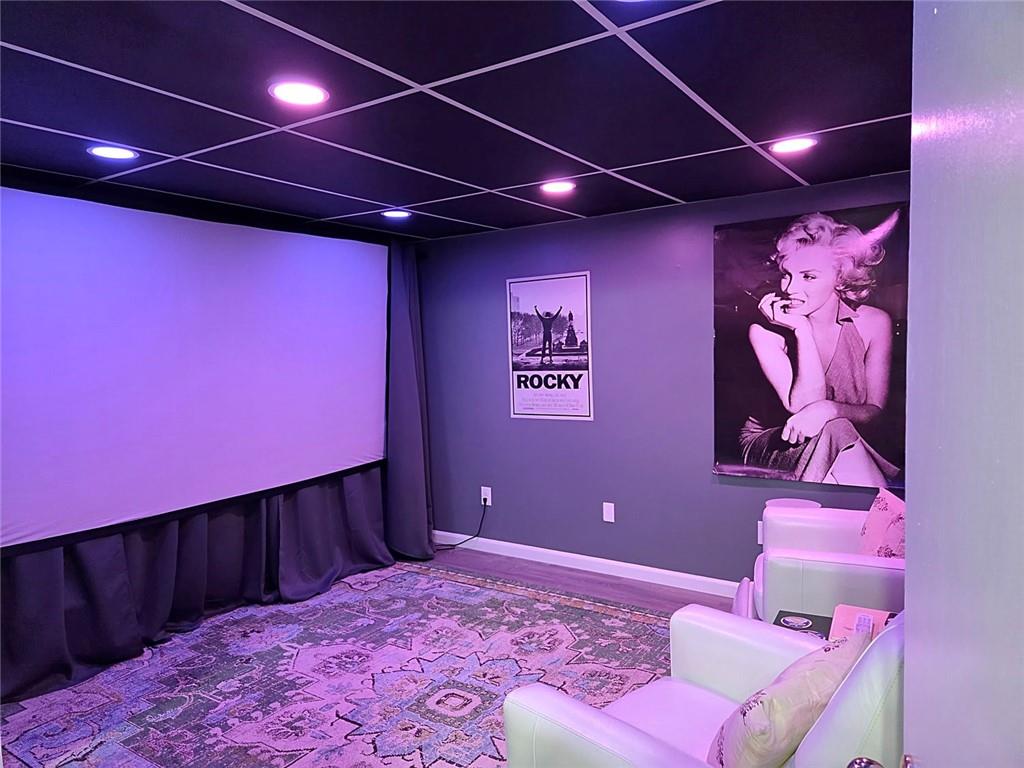 601 Ridgewood Avenue Gainesville, GA 30501 - Photo 22 of 36 a bedroom with a bed and a mirror