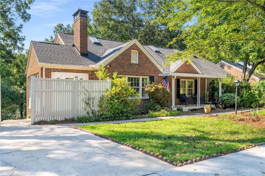 601 Ridgewood Avenue Gainesville, GA 30501 - Photo 25 of 36 a front view of a house with a yard