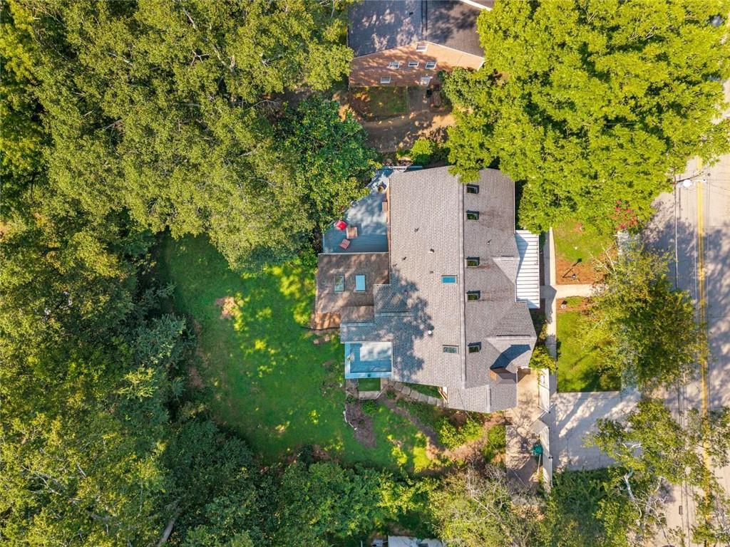601 Ridgewood Avenue Gainesville, GA 30501 - Photo 28 of 36 an aerial view of residential house with outdoor space and trees all around