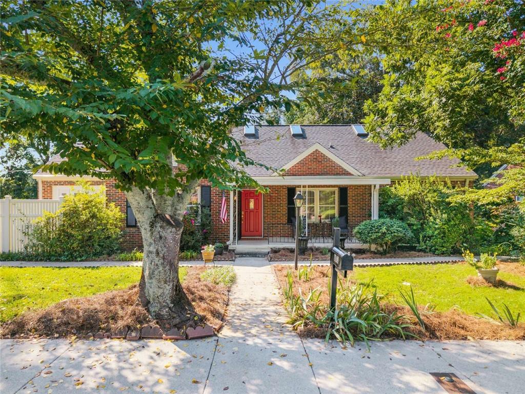 601 Ridgewood Avenue Gainesville, GA 30501 - Photo 29 of 36 a view of a house with swimming pool and sitting area