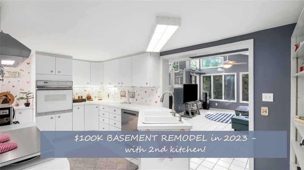 601 Ridgewood Avenue Gainesville, GA 30501 - Photo 7 of 36 a view of kitchen with sink microwave and refrigerator