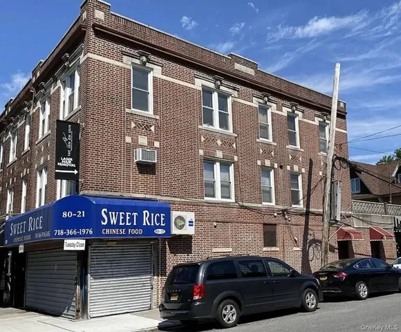 a car parked in front of a building