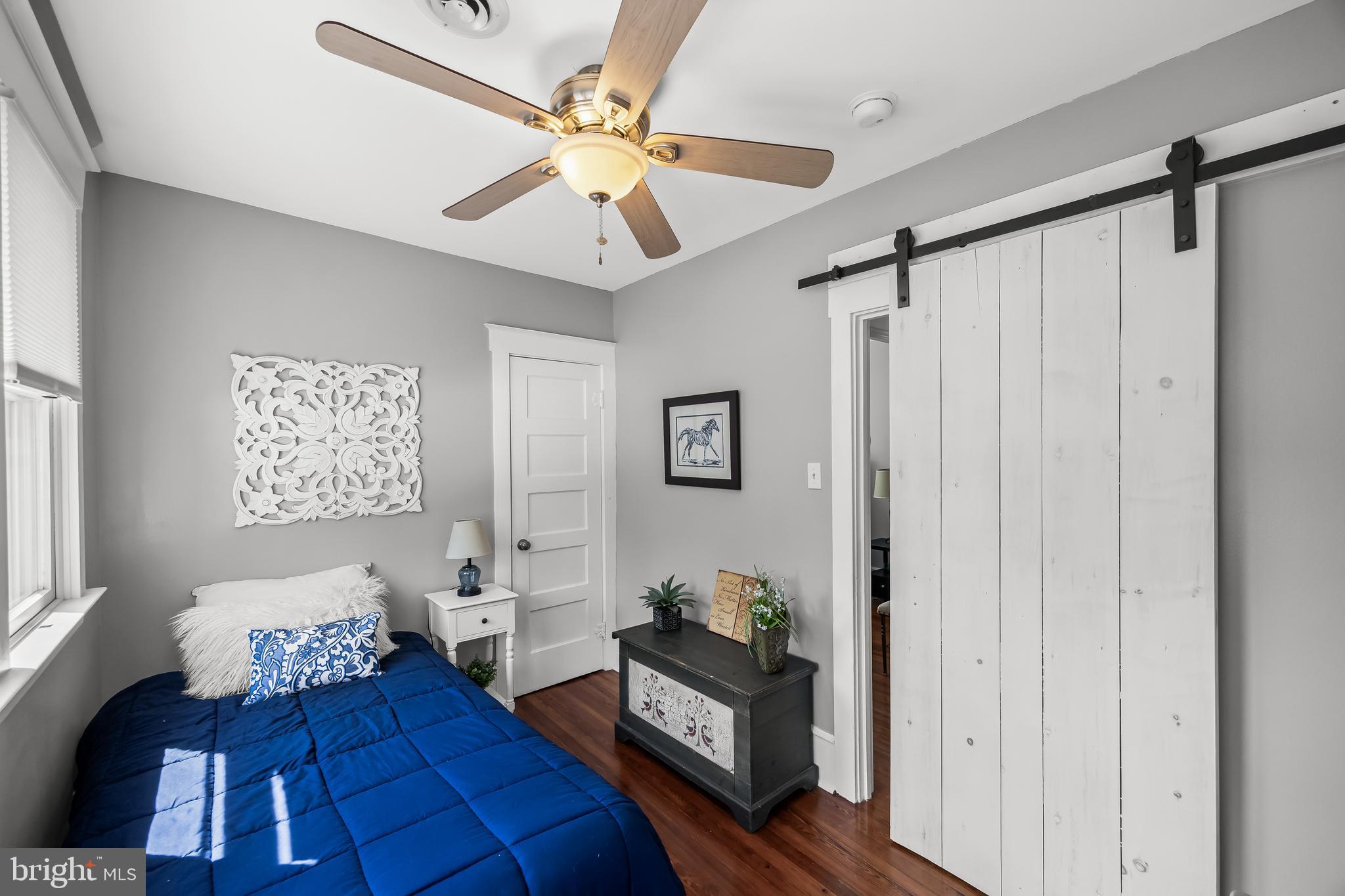 615 North Walnut Avenue Magnolia, NJ 08049 - Photo 24 of 40 a bed room with a bed and a window