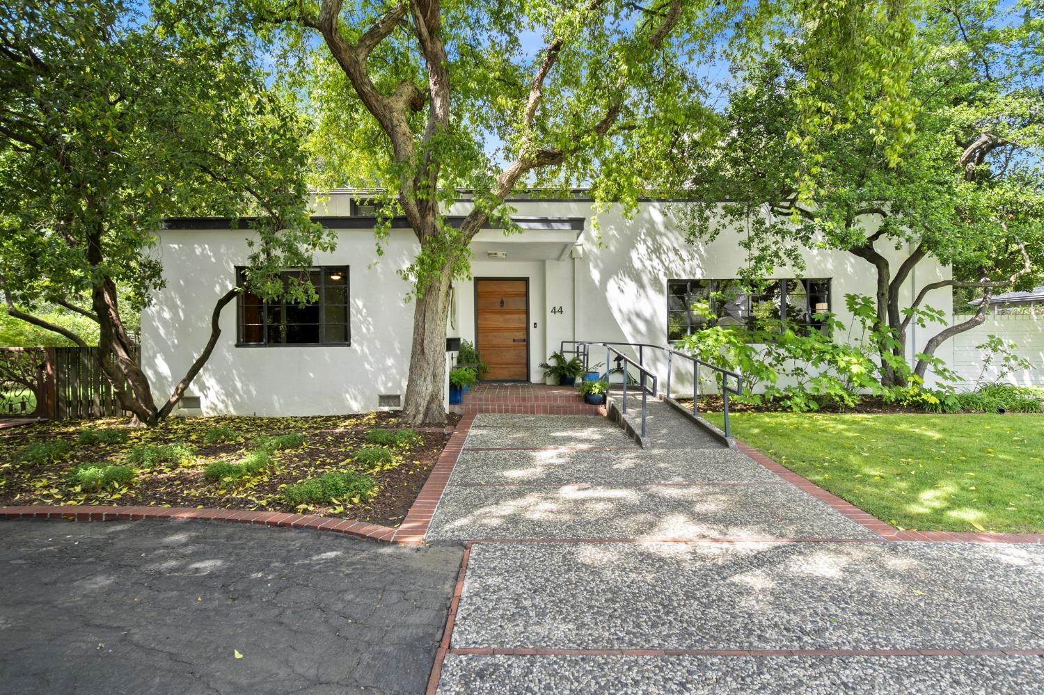 44 College Park Davis, CA 95616 - Photo 1 of 1 a front view of a house with garden