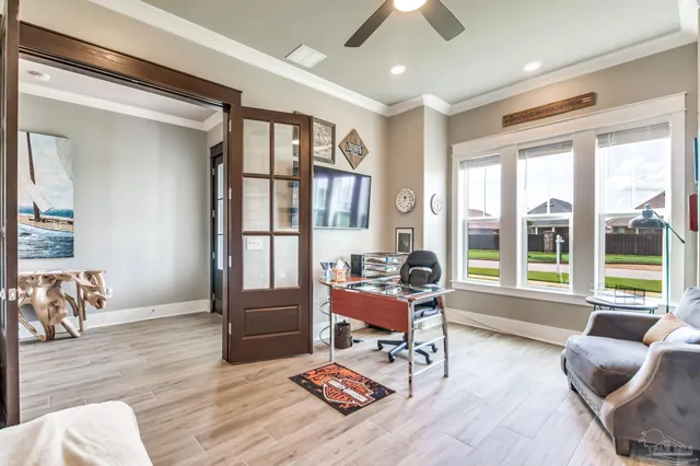 a view of a hallway with wooden floor and closet