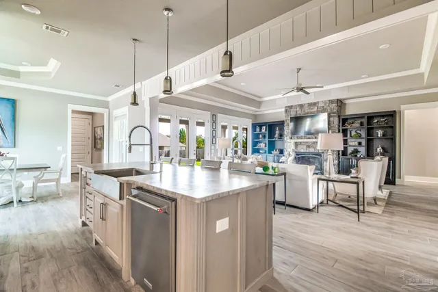 a bedroom with a large bed and a large window