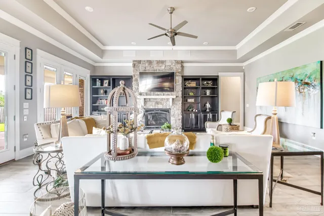 a bedroom with a bed and flat screen tv