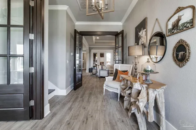 a kitchen with stainless steel appliances granite countertop a sink and a stove