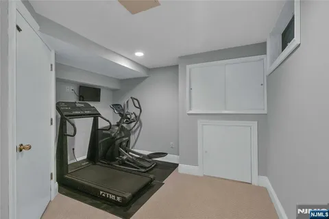 a view of room with gym equipment