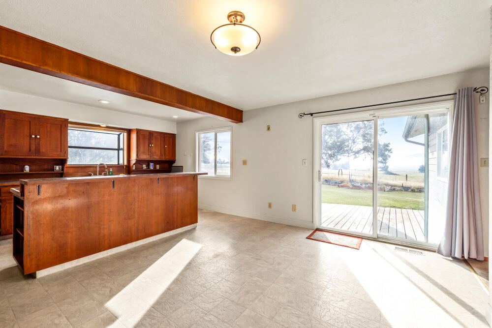 23131 North Poe Valley Road Klamath Falls, OR 97603 - Photo 19 of 45 a view of a kitchen with wooden floor