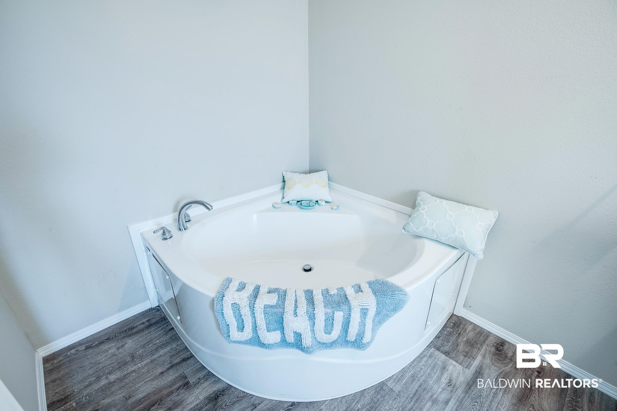 21859 West Side Loop Silverhill, AL 36576 - Photo 21 of 24 Bathroom featuring a bathtub and hardwood / wood-style floors