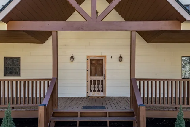 a brick building with a street sign on the wall