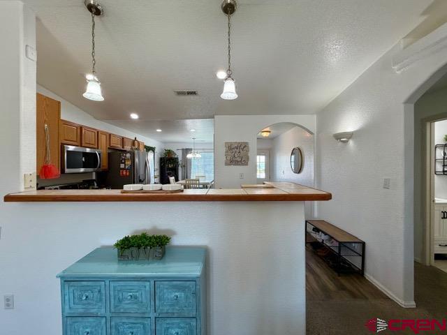 544 20th Street Delta, CO 81416 - Photo 18 of 44 a kitchen with lots of counter space and a sink