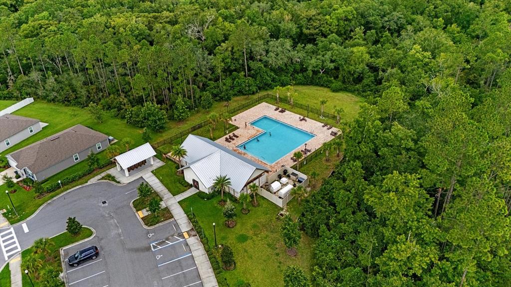 33 Ridge Road Palm Coast, FL 32137 - Photo 27 of 31 an aerial view of a house with a yard