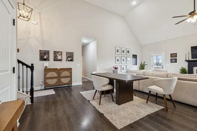 a living room with furniture and a table