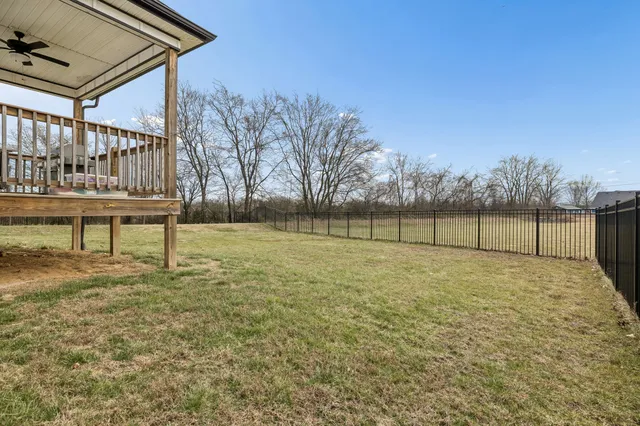 a view of two chairs in the balcony