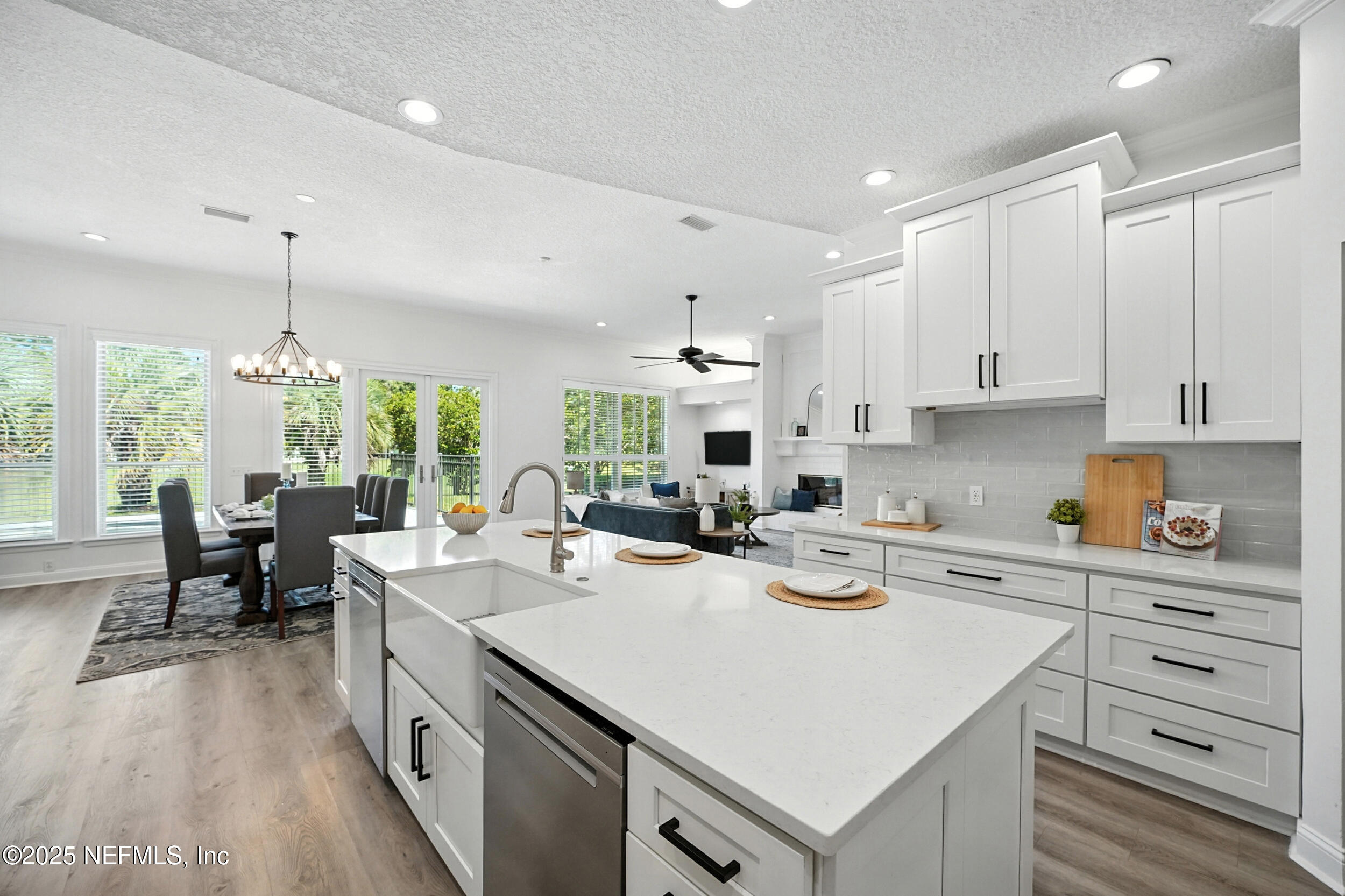 3743 Cricket Cove Road East Jacksonville, FL 32224 - Photo 12 of 55 a kitchen with a stove a sink and a refrigerator