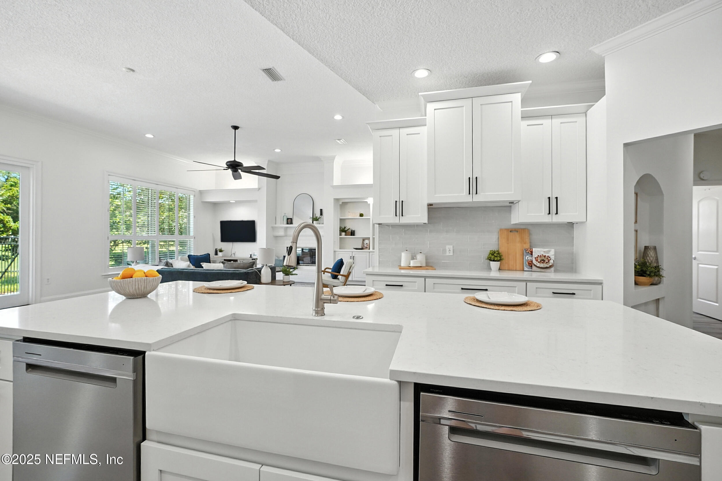 3743 Cricket Cove Road East Jacksonville, FL 32224 - Photo 13 of 55 a kitchen with a sink a stove cabinets and counter space