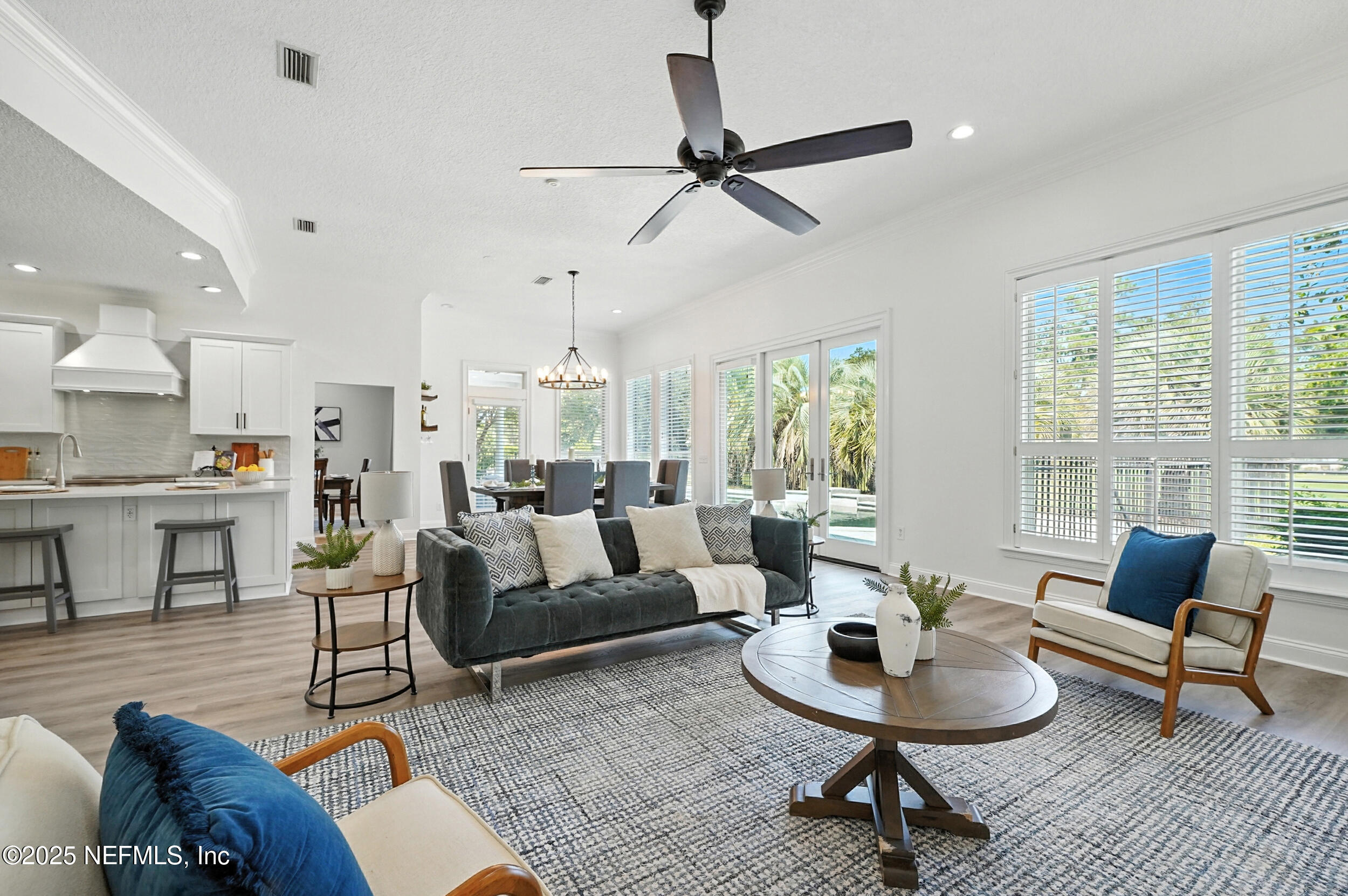 3743 Cricket Cove Road East Jacksonville, FL 32224 - Photo 17 of 55 a living room with furniture and a large window