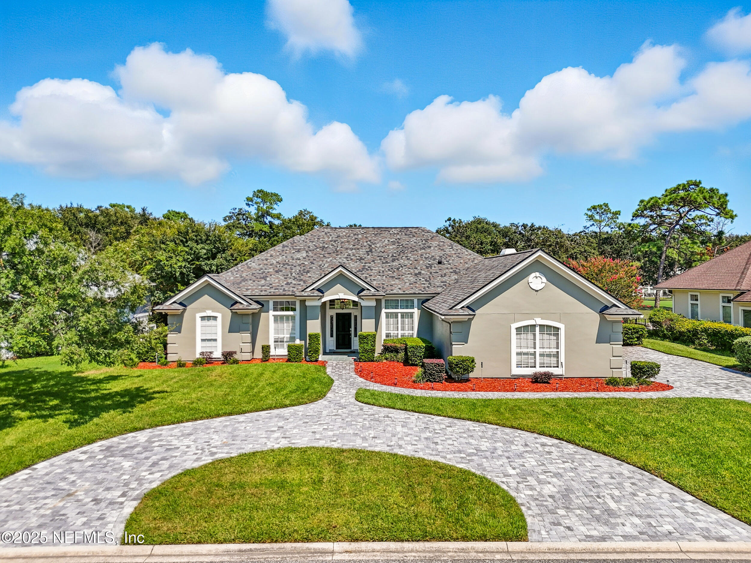 3743 Cricket Cove Road East Jacksonville, FL 32224 - Photo 2 of 55 a front view of a house with a garden and plants