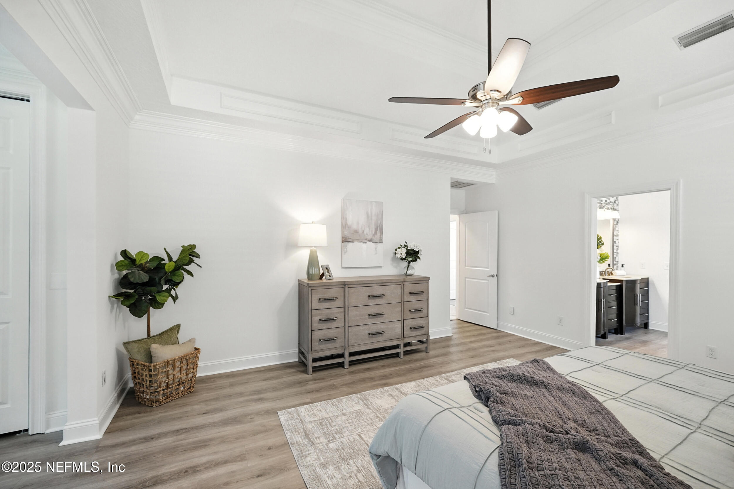 3743 Cricket Cove Road East Jacksonville, FL 32224 - Photo 21 of 55 a bedroom with furniture and a bed