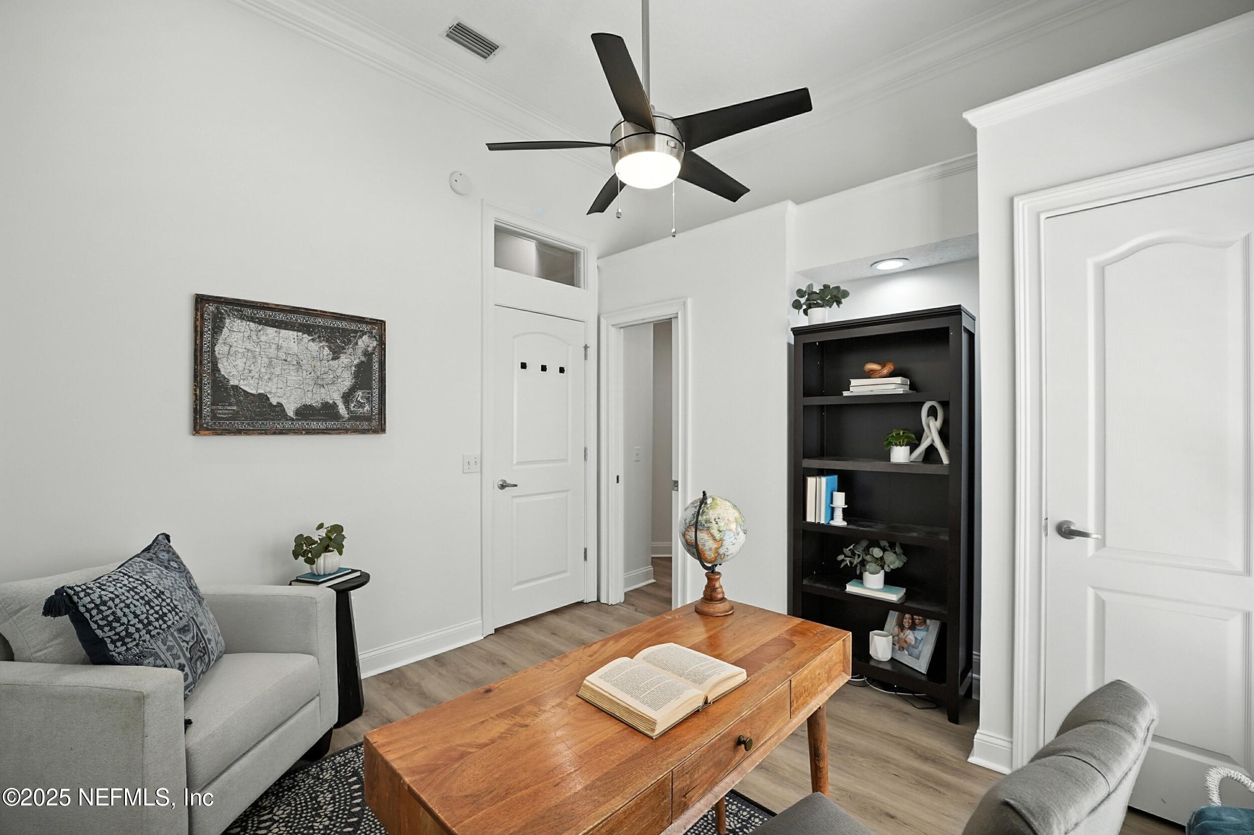 3743 Cricket Cove Road East Jacksonville, FL 32224 - Photo 32 of 55 a living room with furniture and a window