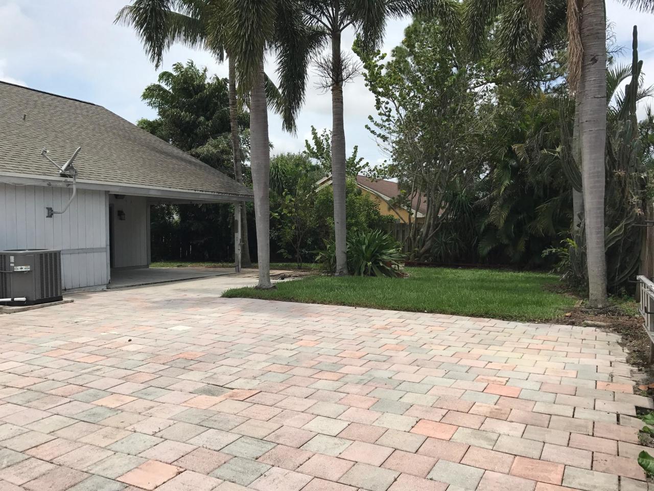 6159 Adams Street Jupiter, FL 33458 - Photo 1 of 13 Back Yard
