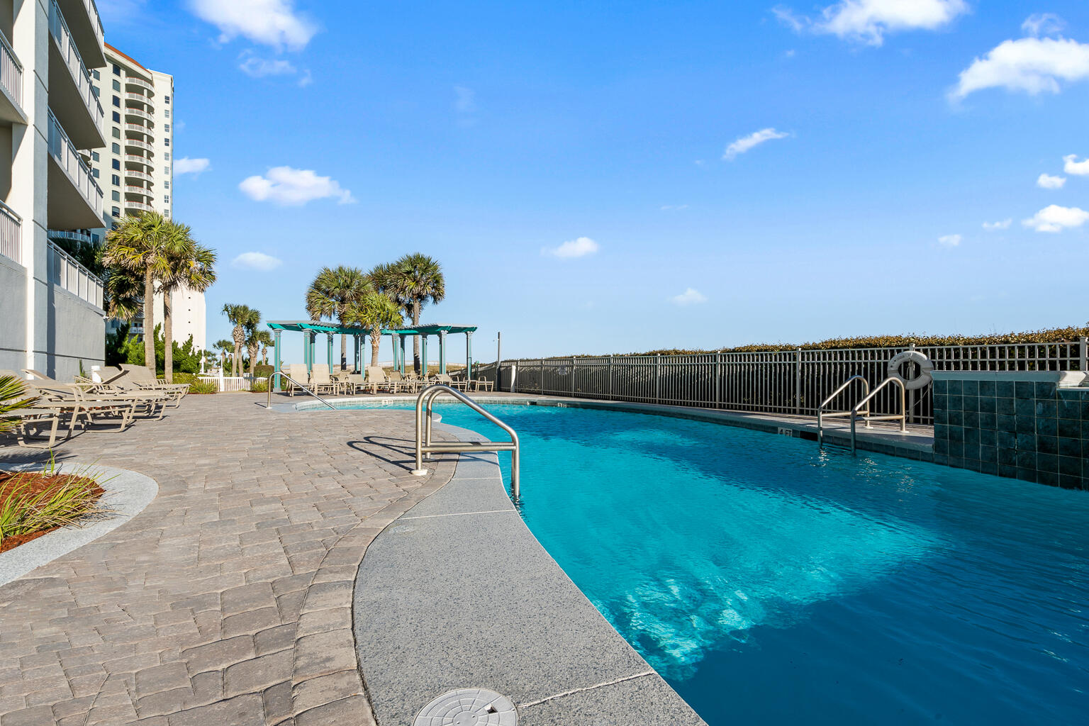 8499 Gulf Boulevard, Unit 303 Navarre, FL 32566 - Photo 39 of 52 a view of swimming pool with outdoor seating
