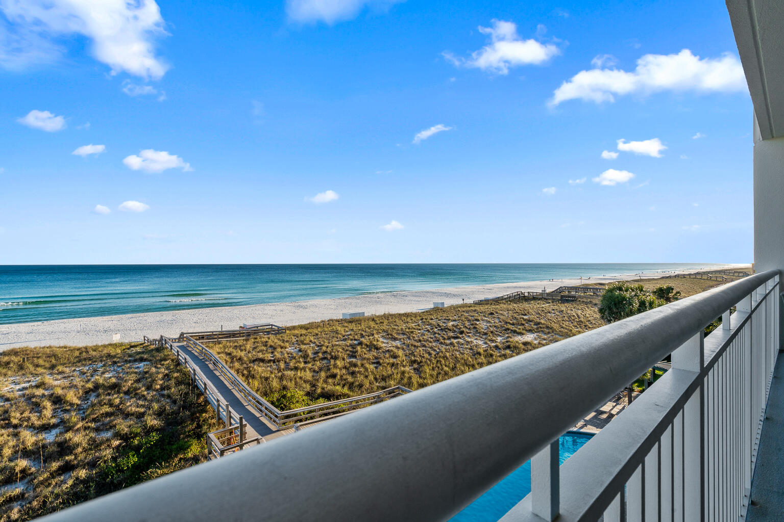 8499 Gulf Boulevard, Unit 303 Navarre, FL 32566 - Photo 51 of 52 a view of a street from a balcony