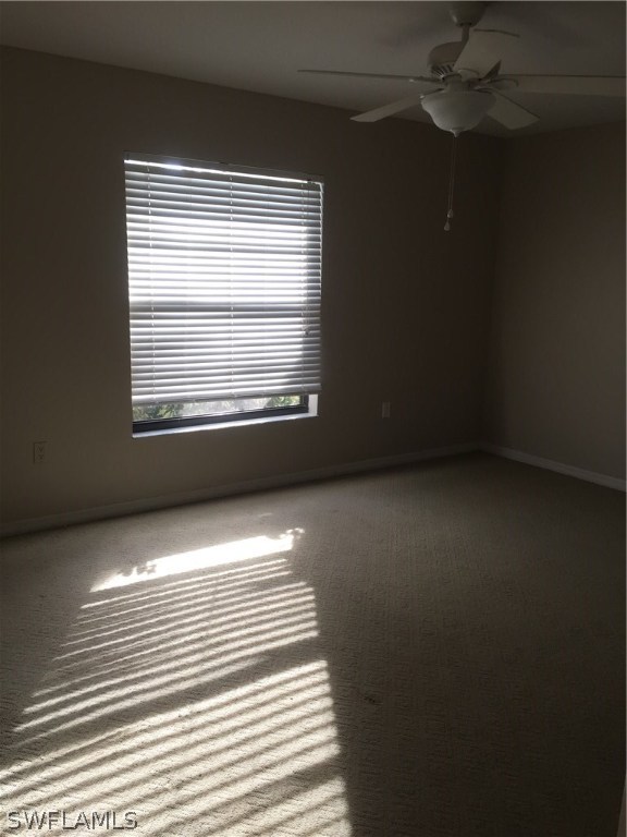17540 Fuchsia Road Fort Myers, FL 33967 - Photo 19 of 25 a view of an empty room with a window