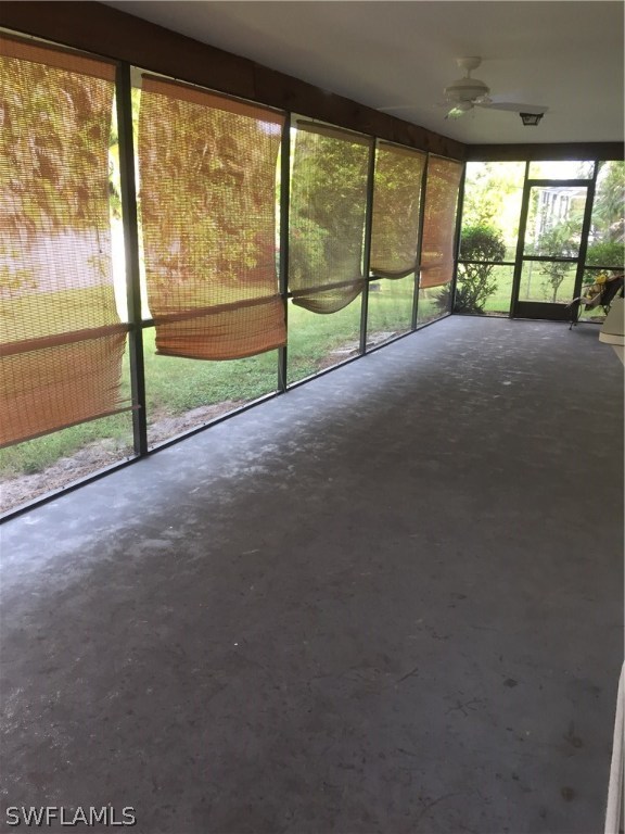 17540 Fuchsia Road Fort Myers, FL 33967 - Photo 9 of 25 a view of empty room with large windows