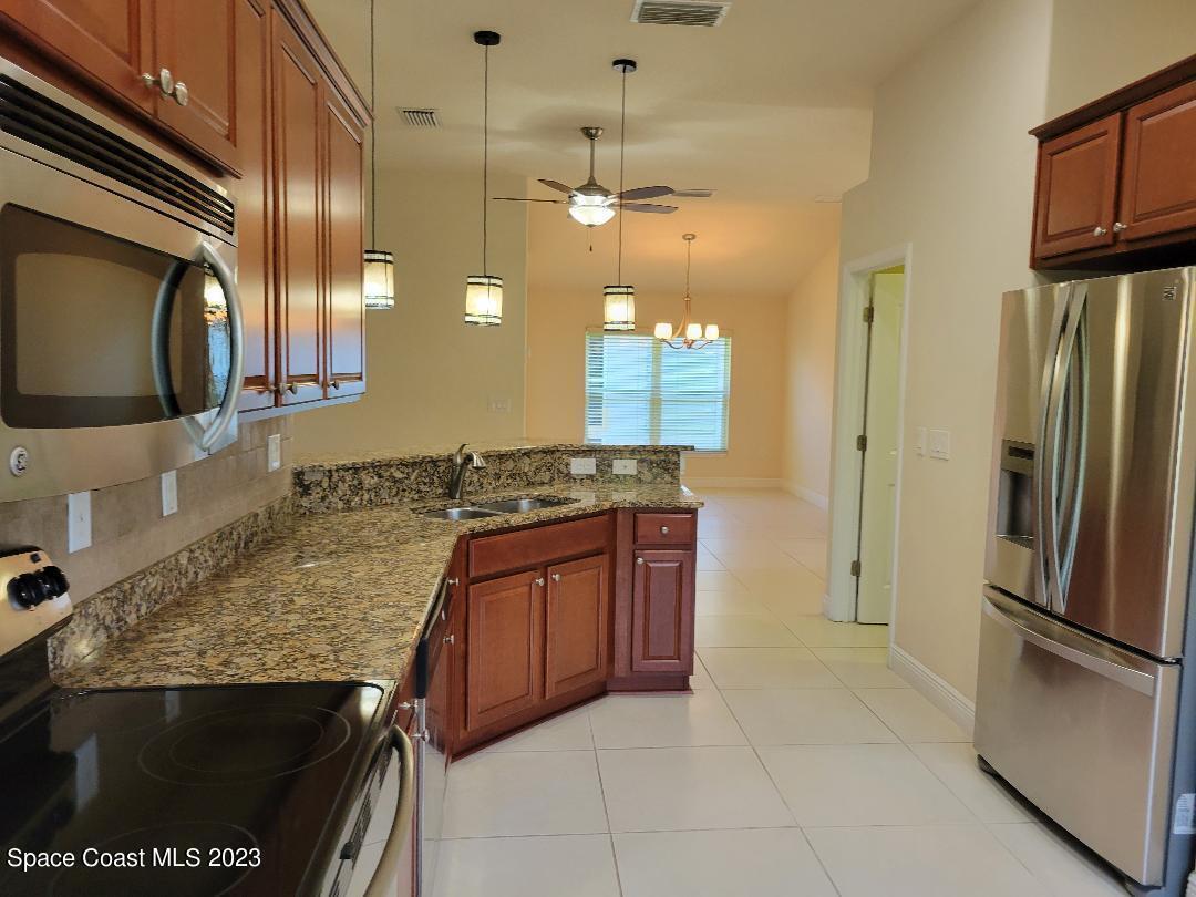 151 Secret Drive Melbourne, FL 32904 - Photo 3 of 19 Kitchen