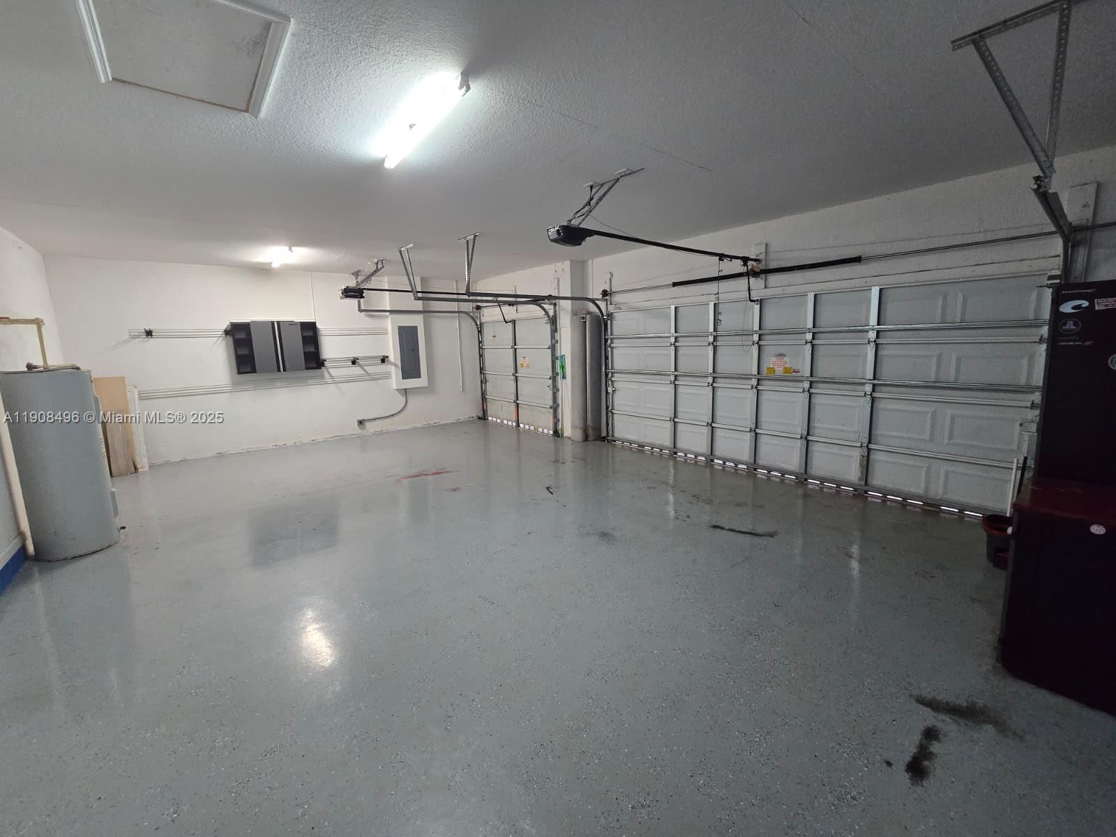 12944 Southwest 222nd Street Miami, FL 33170 - Photo 29 of 44 a view of a garage