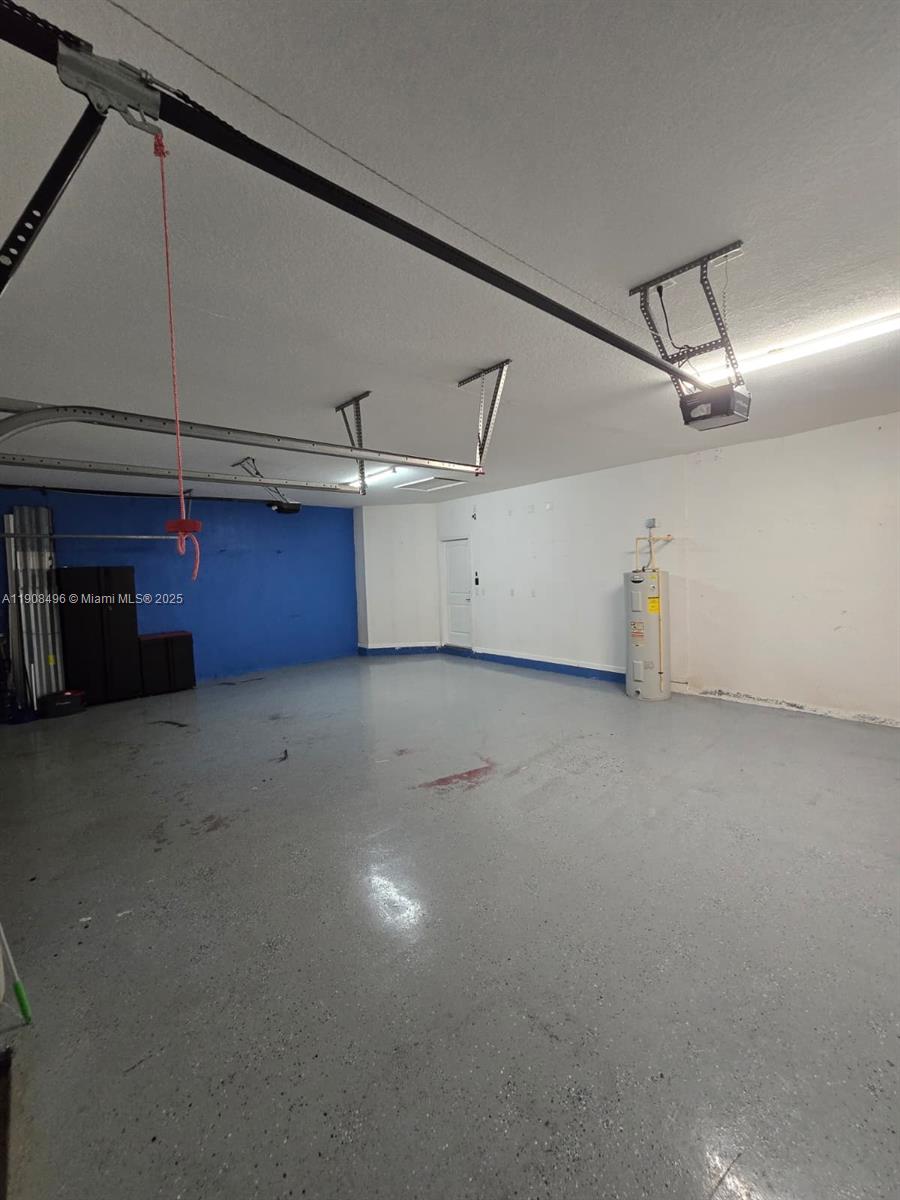 12944 Southwest 222nd Street Miami, FL 33170 - Photo 31 of 44 a view of a garage
