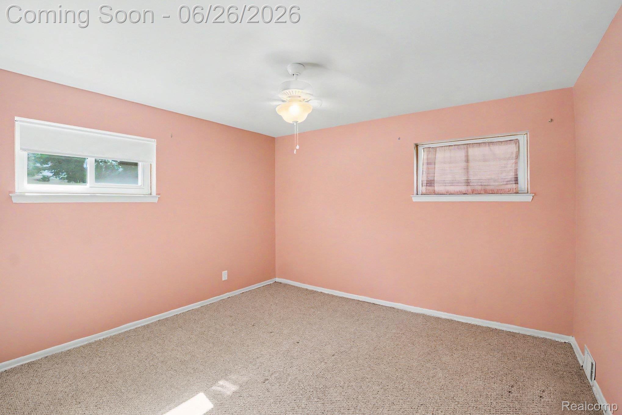 1209 Massoit Road Clawson, MI 48017 - Photo 16 of 25 Carpeted interior space featuring light pink wall coverings and white baseboards