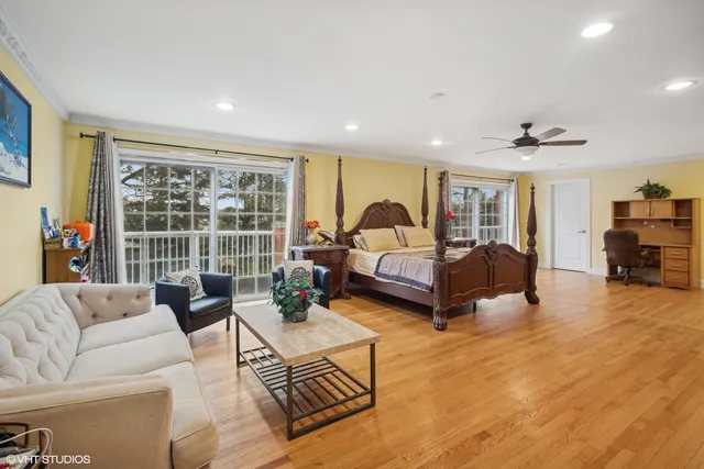 a room with a cabinets and chandelier