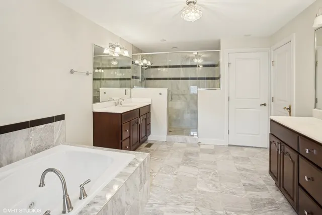 a bed room with a bed and a dresser