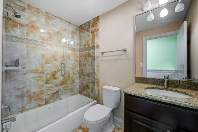 a view of a house with backyard porch and sitting area