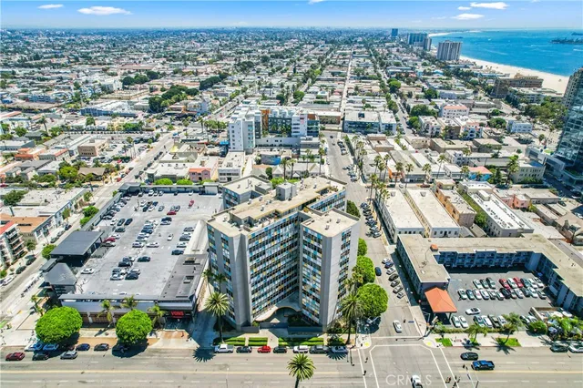 an aerial view of residential building and parking space