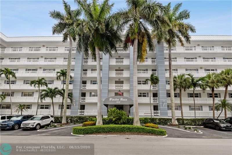 3050 Northeast 47th Court, Unit 301 Fort Lauderdale, FL 33308 - Photo 17 of 19 a front view of a multi story building