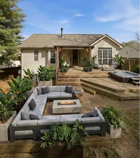 a front view of a house with garden