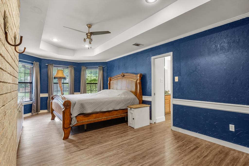 163 Granada Square Canton, TX 75103 - Photo 16 of 39 Primary bedroom with bay windows
